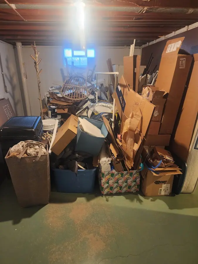 Roll-off dumpster container at job site for Roll Off Dumpster Rental in Fort Scott